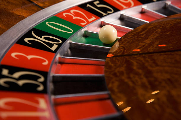 Live casino studio with multiple dealer tables and camera setup